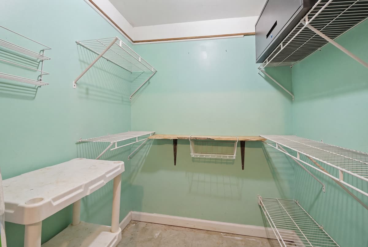 Organized empty pantry ready for real estate photos by Tyler Bowman Photography