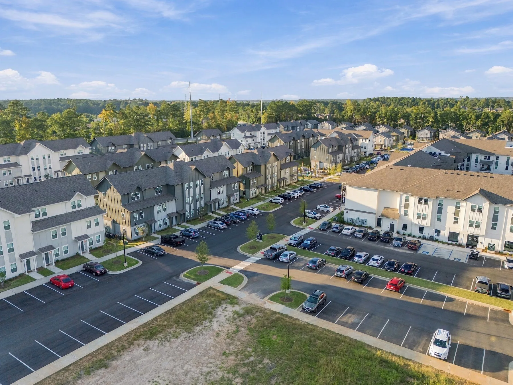 Aerial of a Wiregrass multifamily/commercial property and parking
